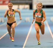 26 February 2014; Kelly Proper on her way to winning the women's 60m event from second place Sarah Lavin, left, during the AIT International Arena Grand Prix. Athlone Institute of Technology International Arena, Athlone, Co. Westmeath. Picture credit: Stephen McCarthy / SPORTSFILE
