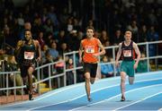 26 February 2014; Tabarie Henry, left, on his way to winning the men's 400m event, from second place Timmy Crowe, centre, and thrid place David McCarthy, right, during the AIT International Arena Grand Prix. Athlone Institute of Technology International Arena, Athlone, Co. Westmeath. Picture credit: Stephen McCarthy / SPORTSFILE