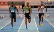 26 February 2014; Ashton Eaton, centre, on his way to winning the men's 60m event, from second place Steven Colvert, right, and third place Damar Forbes, left, during the AIT International Arena Grand Prix. Athlone Institute of Technology International Arena, Athlone, Co. Westmeath. Picture credit: Stephen McCarthy / SPORTSFILE