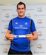 28 February 2014; Leinster's Devin Toner draws out the name of St. Michael's College during the Leinster Schools’ Junior Cup Semi-Finals Draw. Leinster Rugby Head Office, UCD, Belfield, Dublin. Picture credit: Piaras Ó Mídheach / SPORTSFILE