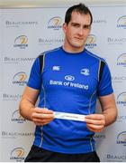 28 February 2014; Leinster's Devin Toner draws out the name of Blackrock College during the Leinster Schools’ Junior Cup Semi-Finals Draw. Leinster Rugby Head Office, UCD, Belfield, Dublin. Picture credit: Piaras Ó Mídheach / SPORTSFILE