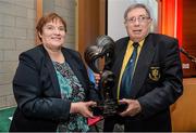 28 February 2014; Dr. Tom Stark receives the Dr. Tony O'Neill memorial award for services to university football from Marjorie Fitzpatrick, at the Eircom Centenary Collingwood Cup Dinner, UCD Sports Centre, Belfield, Dublin. Picture credit: Barry Cregg / SPORTSFILE