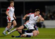 28 February 2014; Tommy Bowe, Ulster, is tackled by Richie Rees, Newport Gwent Dragons. Celtic League 2013/14, Round 16, Ulster v Newport Gwent Dragons. Ravenhill Park, Belfast, Co. Antrim. Picture credit: Oliver McVeigh / SPORTSFILE