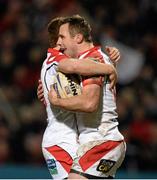 28 February 2014; Tommy Bowe, Ulster, celebrates with team-mate Paddy Jackson after scoring his second try of the night. Celtic League 2013/14, Round 16, Ulster v Newport Gwent Dragons. Ravenhill Park, Belfast, Co. Antrim. Picture credit: Oliver McVeigh / SPORTSFILE