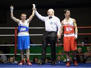 28 February 2014: Paddy Barnes, left, Holy Family Boxing Club, is declared the winner over Blaine Dobbins, St Josephs Boxing Club, following their 49kg bout. IABA Elite National Championship Semi-Finals, National Stadium, Dublin. Picture credit: Ray Lohan / SPORTSFILE