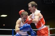 28 February 2014; Hughie Myers, right, Ryston Boxing Club, exchanges punches with Thomas Waite, Cairn Lodge Boxing Club, during their 49 kg bout. 2014 National Elite Boxing Championship Finals, National Stadium, Dublin. Picture credit: Ray Lohan / SPORTSFILE