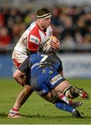 28 February 2014; Rob Herring, Ulster, is tackled by Nic Cudd, Newport Gwent Dragons. Celtic League 2013/14, Round 16, Ulster v Newport Gwent Dragons. Ravenhill Park, Belfast, Co. Antrim. Picture credit: Oliver McVeigh / SPORTSFILE