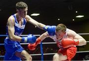 28 February 2014; Michael Nevin, Portlaoise Boxing Club, exchanges punches with Ray Moylette, St Annes Boxing Club, right, during their 64 kg bout. 2014 National Elite Boxing Championship Finals, National Stadium, Dublin. Picture credit: Ray Lohan / SPORTSFILE