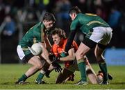 1 March 2014; Kevin Dyas, Armagh, passes under pressure from Donal Keoghan, left, and Bryan Menton, Meath. Allianz Football League, Division 2, Round 3, Meath v Armagh, Páirc Tailteann, Navan, Co. Meath. Picture credit: Ramsey Cardy / SPORTSFILE