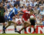 6 August 2005; Brian Dooher, Tyrone, in action against Gary McQuaid, Monaghan. Bank of Ireland All-Ireland Senior Football Championship Qualifier, Round 4, Tyrone v Monaghan, Croke Park, Dublin. Picture credit; Brendan Moran / SPORTSFILE