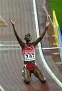 8 August 2005; Docus Inzikuru, Uganda, celebrates after victory in the Women's 3000m steeplechase Final. 2005 IAAF World Athletic Championships, Helsinki, Finland. Picture credit; Pat Murphy / SPORTSFILE