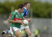 30 July 2005; James Gill, Mayo, in action against Cavan. Bank of Ireland Football Championship qualifer, Round 4. Mayo v Cavan, Dr. Hyde Park, Roscommon. Picture credit; Matt Browne / SPORTSFILE