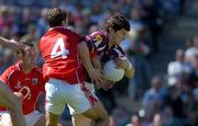 7 August 2005; Micheal Meehan, Galway, in action against Gary Murphy (4) and Kieran O'Connor, Cork. Bank of Ireland Senior Football Championship Quarter-Final, Galway v Cork, Croke Park, Dublin. Picture credit; Brendan Moran / SPORTSFILE