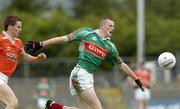 30 July 2005; Pierce Hanley, Mayo, is tackled by Paul Kernan, Armagh. All-Ireland Minor Football Quarter-Final, Mayo v Armagh, Dr. Hyde Park, Roscommon. Picture credit; Matt Browne / SPORTSFILE