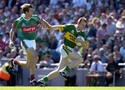 7 August 2005; Liam Hassett, Kerry, is tackled by Ronan McGarrity, Mayo. Bank of Ireland Senior Football Championship Quarter-Final, Kerry v Mayo, Croke Park, Dublin. Picture credit; Brendan Moran / SPORTSFILE