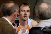 10 August 2005; Peter Coghlan, Ireland, speaks to journalists after finishing in 7th place in his Men's 110m Hurdles heat. He failed to qualify for the next round. 2005 IAAF World Athletic Championships, Helsinki, Finland. Picture credit; Pat Murphy / SPORTSFILE