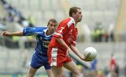 6 August 2005; Gavin Devlin, Tyrone, in action against Tomas Freeman, Monaghan. Bank of Ireland All-Ireland Senior Football Championship Qualifier, Round 4, Tyrone v Monaghan, Croke Park, Dublin. Picture credit; Damien Eagers / SPORTSFILE