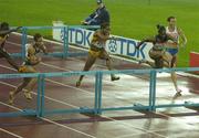 11 August 2005; Michelle Perry, USA, clears the final hurdle ahead of second placed Delloreen Ennis-London, extreme left, team-mate Joanna Hayes, USA, second from left, and third placed Brigitte Foster-Hylton, centre, on her way to winning the Women's 100m Hurdles Final. 2005 IAAF World Athletic Championships, Helsinki, Finland. Picture credit; Pat Murphy / SPORTSFILE