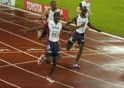 11 August 2005; Justin Gatlin, USA, celebrates as he crosses the line ahead of team-mates third placed John Capel, right, and Fourth placed Tyson Gay, back, for victory in the Men's 200m Final. 2005 IAAF World Athletic Championships, Helsinki, Finland. Picture credit; Pat Murphy / SPORTSFILE