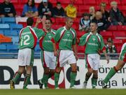 11 August 2005; Neal Fenn, Cork City, is congratulates team mate Roy O' Donovan after Fenn scored the opening goal of the game. UEFA Cup, 2nd round, 1st leg, Djurgardens IF v Cork City, Rasunda Stadium, Solna, Stockholm, Sweden. Picture credit; Paddy Cummins / SPORTSFILE