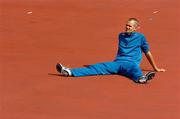 12 August 2005; Sweden's Stefan Holm relaxes during the final round of qualifying for the Men's High Jump Final. 2005 IAAF World Athletic Championships, Helsinki, Finland. Picture credit; Pat Murphy / SPORTSFILE