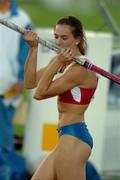 12 August 2005; Yelena Isinbayeva, Russia, kisses the pole as she celebrates victory in the Women's Pole Vault competition and setting a new world record of 5.1 metres in the process. 2005 IAAF World Athletic Championships, Helsinki, Finland. Picture credit; Pat Murphy / SPORTSFILE