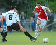 12 August 2005; Alan Reilly, St Patrick's Athletic, in action against Ciaran Martyn, Derry City. eircom League, Premier Division, St Patrick's Athletic v Derry City, Richmond Park, Dublin. Picture credit; David Maher / SPORTSFILE