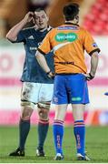 1 March 2014; Munster's James Coughlan in conversation with referee Dudley Phillips. Celtic League 2013/14, Round 16, Scarlets v Munster, Parc Y Scarlets, Llanelli, Wales. Picture credit: Steve Pope / SPORTSFILE