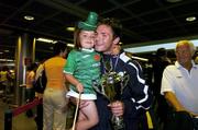 8 August 2005; Republic of Ireland U.17 International Stephen Lawless, is greeted by his 3 year old sister Zara on the Republic of Ireland U17 team's arrival at Dublin Airport following their victory in the Nordic Cup Championship Final in Iceland. Dublin Airport, Dublin. Picture credit; David Maher / SPORTSFILE