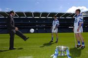 10 August 2005; Sean Kelly, left, President GAA, shows off his football skills to John McCaffrey, far right, Dublin minor hurling captain and Richie Dalton, Offaly minor football captain, at the announcement that ESB will sponsor the Minor Football and Hurling Championships for the next three years. Croke Park, Dublin. Picture credit; David Maher / SPORTSFILE