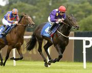 14 August 2005; Seal Colony, with Declan McDonogh up, on their way to winning the Irish Stallion Farms EBF Maiden, from second place Spanish Armada with Wayne Lordan, Leopardstown Racecourse, Dublin. Picture credit; Matt Browne / SPORTSFILE
