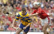 14 August 2005; Diarmuid McMahon, Clare, in action against Ronan Curran, Cork. Guinness All-Ireland Senior Hurling Championship Semi-Final, Cork v Clare, Croke Park, Dublin. Picture credit; Damien Eagers / SPORTSFILE