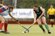 14 August 2005; Eimer Cregan, Ireland, in action against Peggy Bergere, France. 7th Women's European Nations Hockey Championship, Pool A, Ireland v France, Belfield, UCD, Dublin. Picture credit; Matt Browne / SPORTSFILE