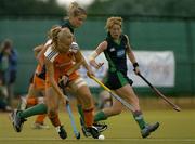 17 August 2005; Janneke Schopmann, Netherlands, in action against Linda Caulfield and Jill Orbinson, right, Ireland. 7th Women's European Nations Hockey Championship, Pool A, Ireland v Netherlands, Belfield, UCD, Dublin. Picture credit; Brendan Moran / SPORTSFILE