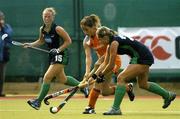 17 August 2005; Sylvia Karres, Netherlands, in action against Katharine Smyth and Ciara O'Brien, left. 7th Women's European Nations Hockey Championship, Pool A, Ireland v Netherlands, Belfield, UCD, Dublin. Picture credit; Brendan Moran / SPORTSFILE