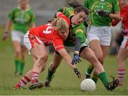 2 March 2014; Emma Farmer, Cork, in action against Emma Sherwood, Kerry. Tesco Homegrown Ladies National Football League, Division 1, Round 4, Kerry v Cork, Pairc an Aghasaigh, Dingle, Co.Kerry. Picture credit: Brendan Moran / SPORTSFILE