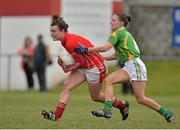 2 March 2014; Doireann O'Sullivan, Cork, in action against Gina Crowley, Kerry. Tesco Homegrown Ladies National Football League, Division 1, Round 4, Kerry v Cork, Pairc an Aghasaigh, Dingle, Co.Kerry. Picture credit: Brendan Moran / SPORTSFILE