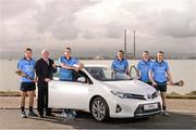 3 March 2014; At the announcement of Toyota Ireland becoming the official car partner to Dublin GAA is Dublin hurling selector Ciaran Hetherton, with, from left, Dublin hurlers Conal Keaney, Peter Kelly, Liam Rushe,  Michael Carton and Johnny McCaffrey. As part of the three year deal Toyota will provide a total of 16 vehicles which will see players and management of the Dublin senior football and hurling teams enjoy the comfort, quality and reliability that Toyota vehicles are renowned for. Bull Island, Dublin. Photo by Sportsfile