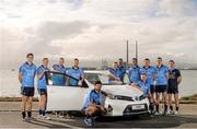 3 March 2014; At the announcement of Toyota Ireland becoming the official car partner to Dublin GAA are, from left, Dublin footballers Rory O'Carroll and Darren Daly, Dublin hurler Michael Carton, Dublin footballers Jonny Cooper and Cian O'Sullivan, Dublin hurlers Johnny McCaffrey and Liam Rushe, Dublin footballer James McCarthy, Eoghan O'Gara, Dublin hurler Conal Keaney and Peter Kelly, and Dublin footballer Stephen Cluxton. As part of the three year deal Toyota will provide a total of 16 vehicles which will see players and management of the Dublin senior football and hurling teams enjoy the comfort, quality and reliability that Toyota vehicles are renowned for. Bull Island, Dublin. Photo by Sportsfile