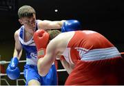 28 February 2014; Michael Nevin, left, Portlaoise Boxing Club, exchanges punches with Ray Moylette, St. Annes Boxing Club, during their 64Kg bout. 2014 National Elite Boxing Championship Finals, National Stadium, Dublin. Picture credit: Ray Lohan / SPORTSFILE