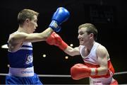 28 February 2014; Hughie Myers, right, Ryston Boxing Club, exchanges punches with Thomas Waite, Cairn Lodge Boxing Club, during their 49Kg bout. 2014 National Elite Boxing Championship Finals, National Stadium, Dublin. Picture credit: Ray Lohan / SPORTSFILE