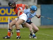 14 August 2005; Joyce Donnelly, Dublin, in action against Emer Carragher, Armagh. All-Ireland Junior Camogie Championship Semi-Final, Dublin v Armagh, Parnell Park, Dublin. Picture credit; David Maher / SPORTSFILE