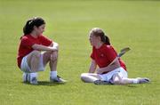 16 August 2005; Chelsea Spain, left, chats with her friend Michaela Byrne, both aged 12, from Sheriff St., during a break at the Docklands Festival of Gaelic Football and Hurling. The Festival was developed to help young people from the Docklands further develop their hurling and football skills and become more confident and accomplished players. Parnell Park, Dublin. Picture credit; Brian Lawless / SPORTSFILE