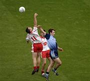 13 August 2005; Bryan Cullen, Dublin, in action against Brian McGuigan, 11, and Davy Harte, Tyrone. Bank of Ireland All-Ireland Senior Football Championship Quarter-Final, Dublin v Tyrone, Croke Park, Dublin. Picture credit; Ray McManus / SPORTSFILE
