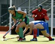 19 August 2005; Jenny McDonough, Ireland, in action against Catriona Forrest, Scotland. 7th Women's European Nations Hockey Championship, Play-Off Game, Ireland v Scotland, Belfield, UCD, Dublin. Picture credit; Brendan Moran / SPORTSFILE