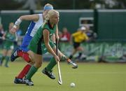 19 August 2005; Catriona Carey, Ireland, in action against Catriona Forrest, Scotland. 7th Women's European Nations Hockey Championship, Play-Off Game, Ireland v Scotland, Belfield, UCD, Dublin. Picture credit; Brendan Moran / SPORTSFILE
