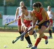 20 August 2005; Jennie Bimson, left, England, in action against Marta Prat, Spain. 7th Women's European Nations Hockey Championship, 3rd / 4th Place Play-Off Game, England v Spain, Belfield, UCD, Dublin. Picture credit; Brendan Moran / SPORTSFILE