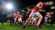 7 February 2014; Ciaran McKeever, right, breaks from the Armagh squad picture. Allianz Football League, Division 2, Round 2, Armagh v Down, Athletic Grounds, Armagh. Picture credit: Oliver McVeigh / SPORTSFILE