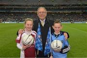 1 March 2014; Donal Bollard, from Allianz, made a special presentation in Croke Park to Grace Murray, St Finians GAA Club, Swords, and Killian Doyle, from Ballymun Kickhams GAA Club, to mark their outstanding performance during the Allianz Cumann na mBunscol competitions. Allianz Football League, Division 1, Round 3, Dublin v Cork, Croke Park, Dublin. Picture credit: Ray McManus / SPORTSFILE