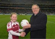 1 March 2014; Donal Bollard, from Allianz, made a special presentation in Croke Park to Grace Murray, St Finians GAA Club, Swords, Co. Dublin, to mark her outstanding performance during the Allianz Cumann na mBunscol competitions. Allianz Football League, Division 1, Round 3, Dublin v Cork, Croke Park, Dublin. Picture credit: Ray McManus / SPORTSFILE